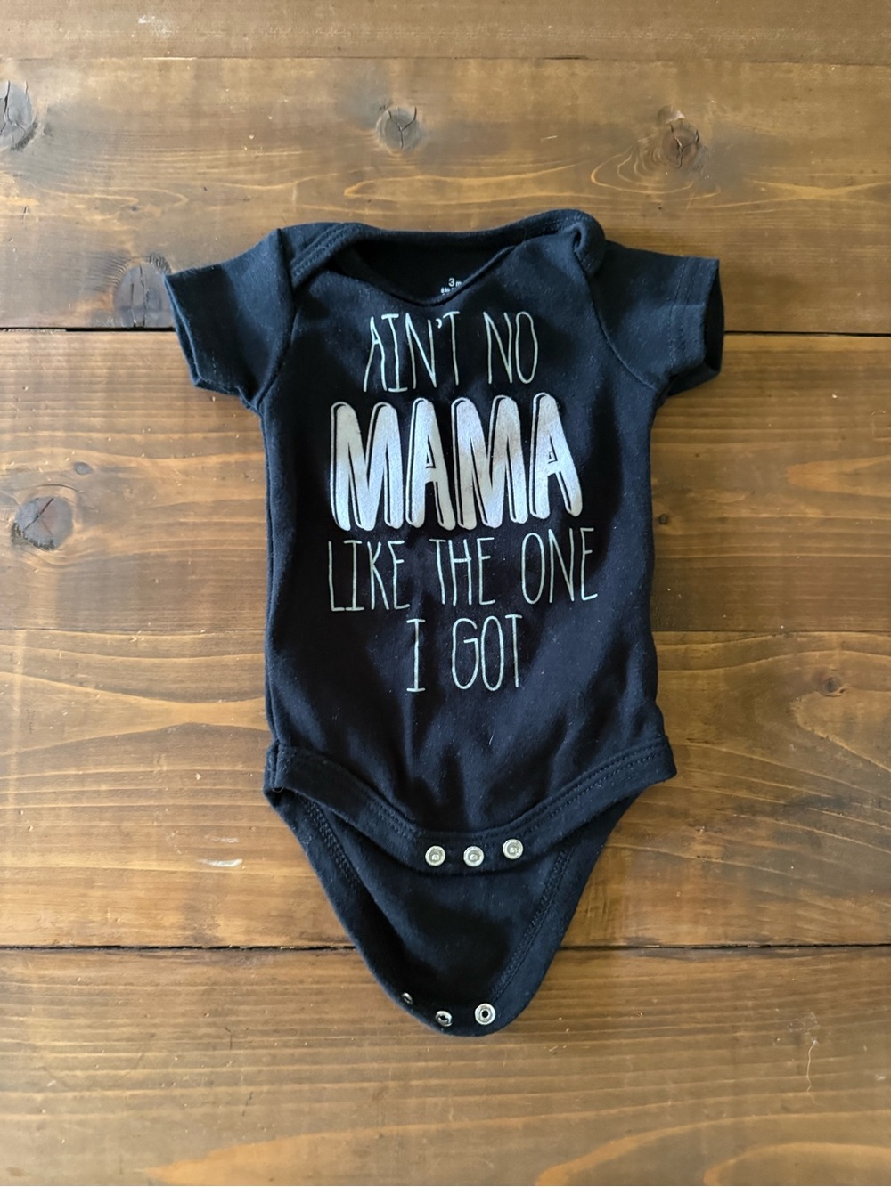 Baby Starters Black One-Piece Bodysuit with White Lettering